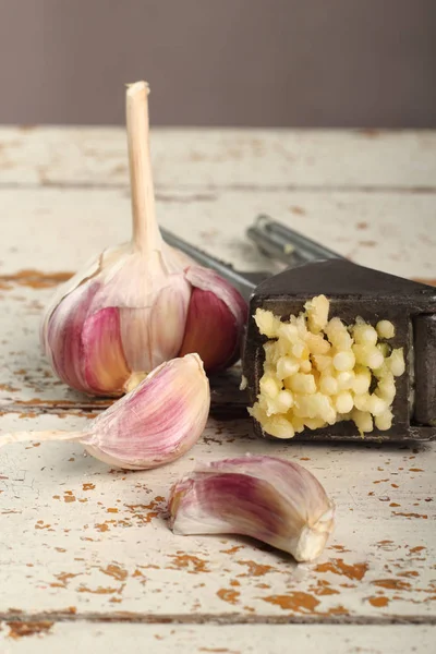 Garlic crushed and garlic press