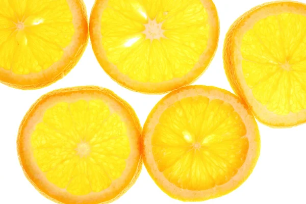 新鮮なオレンジ スライスの背景 — ストック写真