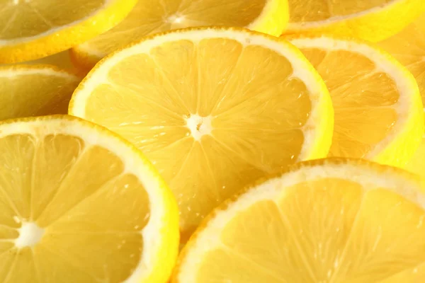 フルーツ背景 新鮮なレモン スライス杭します — ストック写真