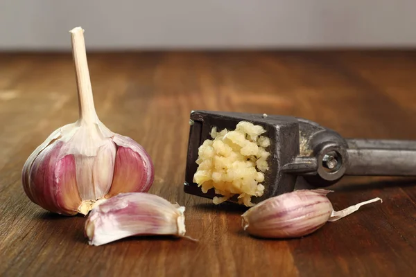 Garlic crushed and garlic press