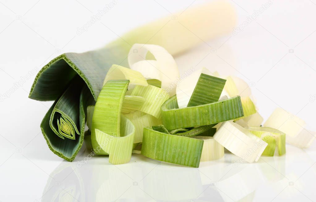 chopped leek isolated on white background