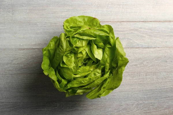 Butter Lettuce on wooden background