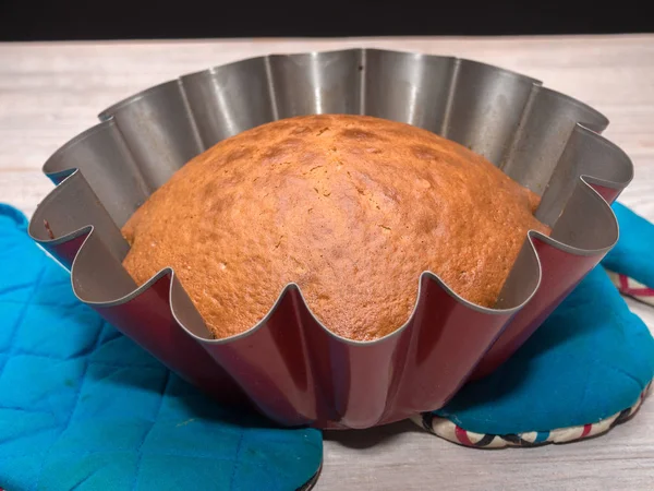 Baked cake in tin. Making Yogurt Cake.