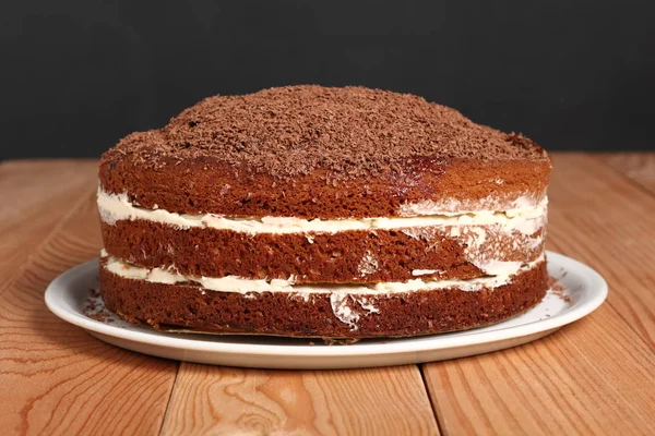 Layer Cake with cream with grated chocolate topping