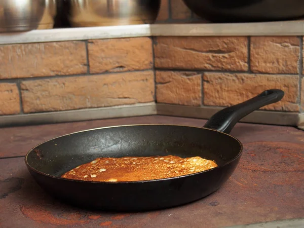 Frying pancakes. Making yeast pancakes (crepes).