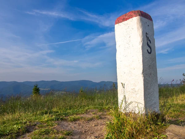 Border pole between Poland and Slovakia in Pieniny Mountains.
