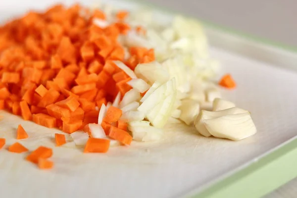 Diced carrot, onion and garlic. Making Lasagna Bolognese Series.