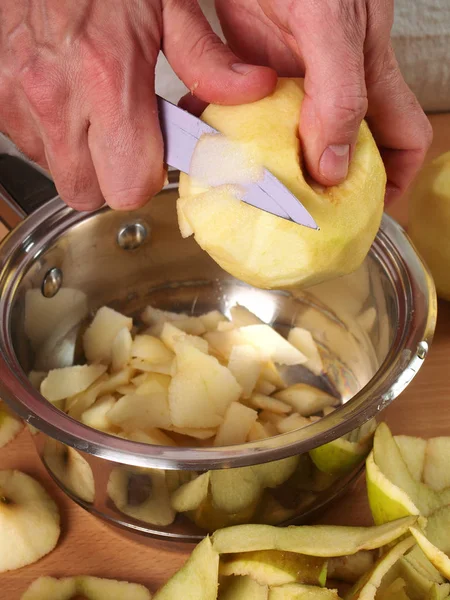 Cut apples into pan. Making Apple Pie Tart Series.