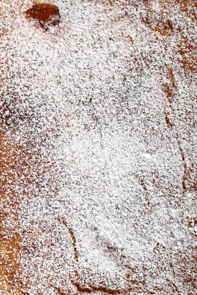 Texture of cream pie covered with powdered sugar. Directly Above Background.