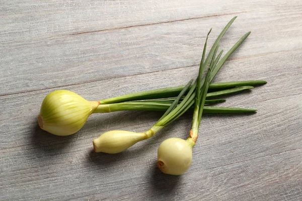 Spring Onions Wooden Background — Stock Photo, Image
