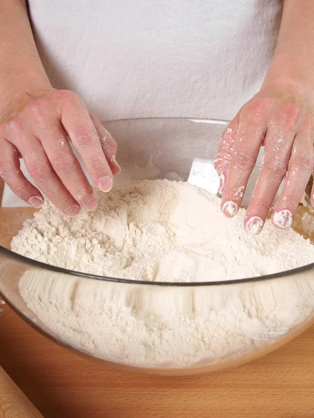 Mixing flour. Making Chocolate Layer Cake with Cream Cheese Filling and Chocolate Topping. Series.