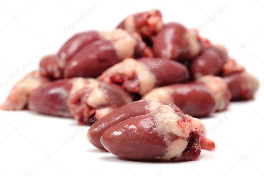 raw chicken hearts isolated on white background