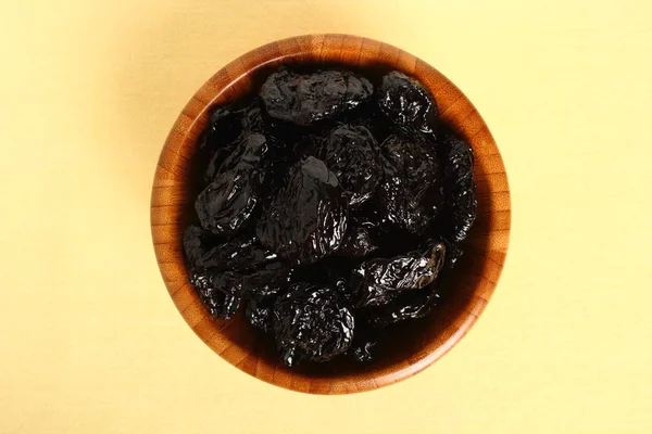 Dried prunes in the bowl
