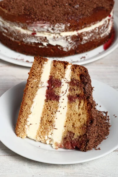 Layer Cake with cream with grated chocolate topping