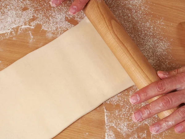 Roll out the dough to a rectangle. Making Puff Pastry Series.