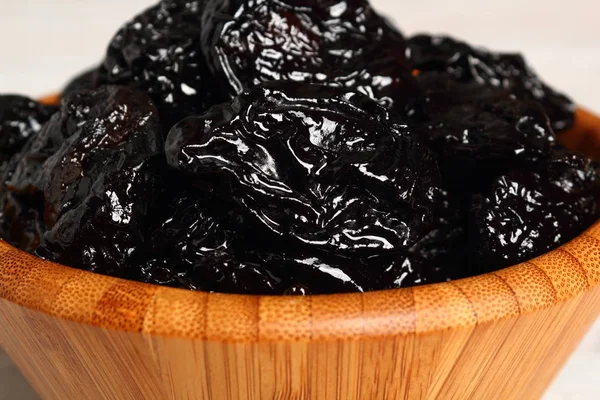 Dried prunes in the bowl