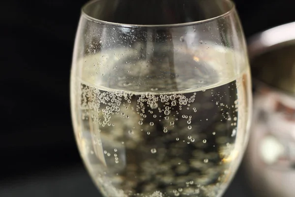 White wine glass with sparkling wine