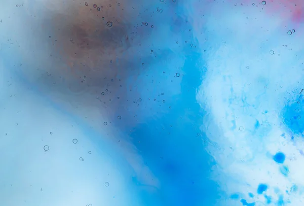 Water and paint textures aerial view, abstract background