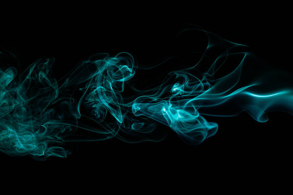 Abstract colored wave smoke on black background