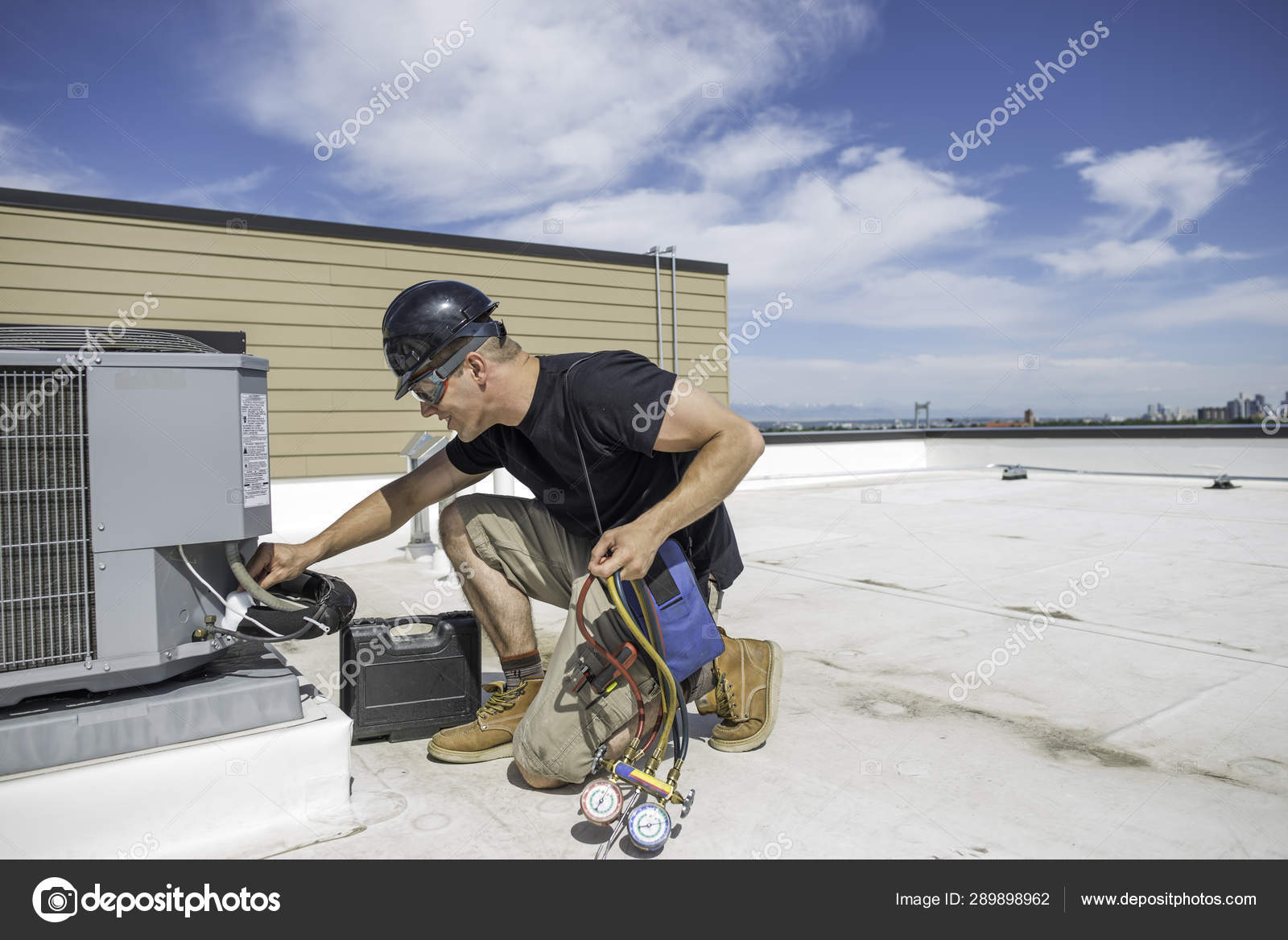 HVAC tech by Condenser Stock Photo by ©spatesphoto 289898962