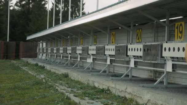 Panorama of targets for shooting at biathlon stadium. Numbering of shooting sports targets. Empty shooting range. Winter sports concept — Stock Video