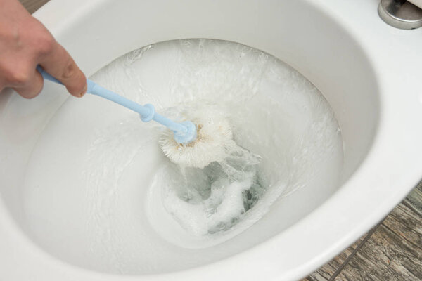 Flush water after cleaning the toilet brush