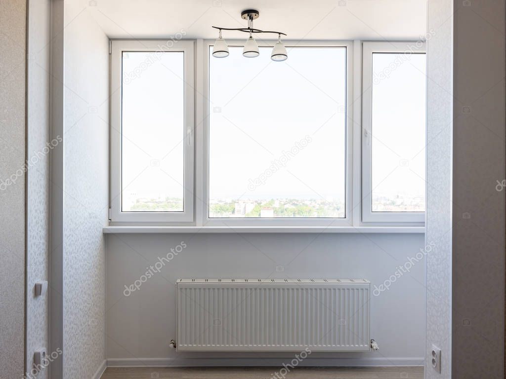 Glazed balcony in the apartment