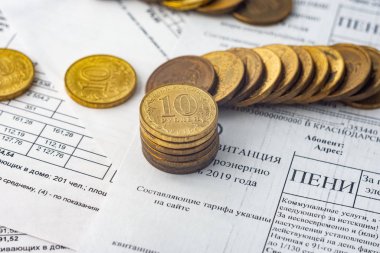 Coins are on the bills, penalties for electricity clipart