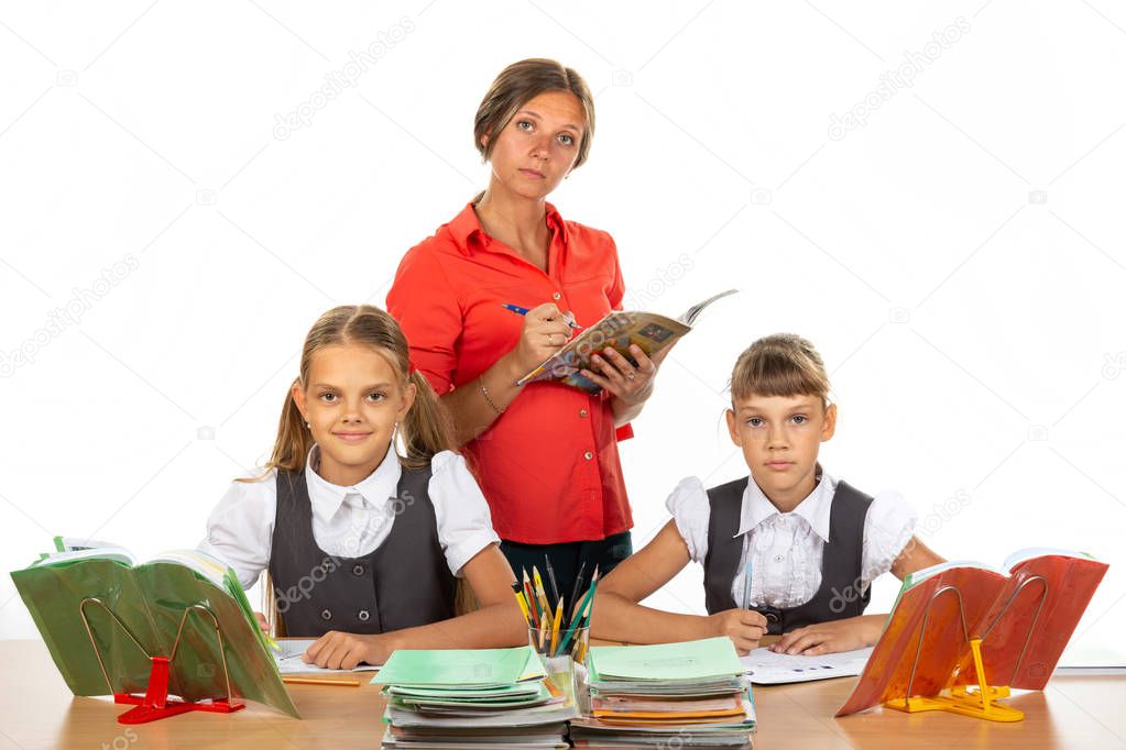 The teacher in the diary gives marks to the students, everyone looks in the frame