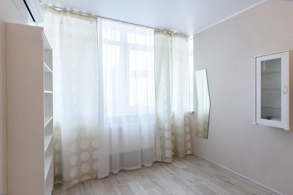 Blind windows in the interior of an apartment room in a multi-storey building