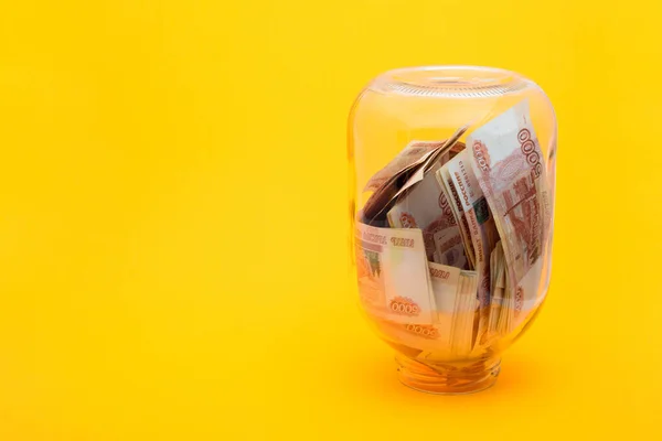 Upturned Glass Jar Five Thousandth Bills — Stock Photo, Image