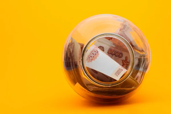 Five Thousandth Notes Packed Glass Jar Lying Its Side — Stock Photo, Image