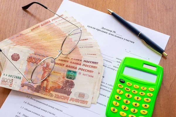 Table Contract Sale Land Plot Bundle Money Calculator Pen Glasses — Stock Photo, Image
