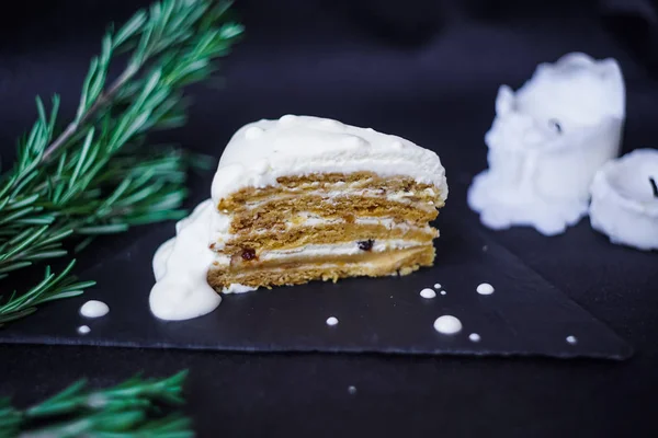 honey cake on black background