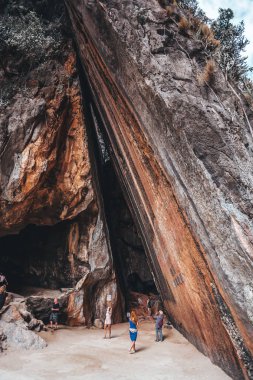 People near the gorge between the rocks Phangnga