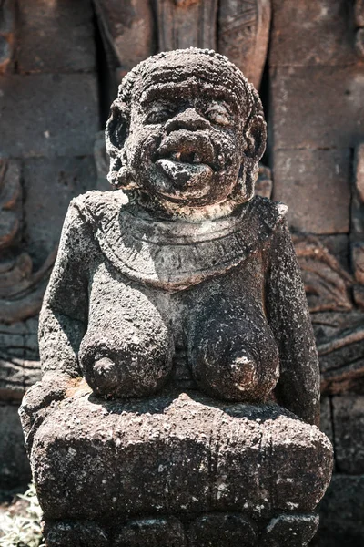 Old weathered religious statue at Bali