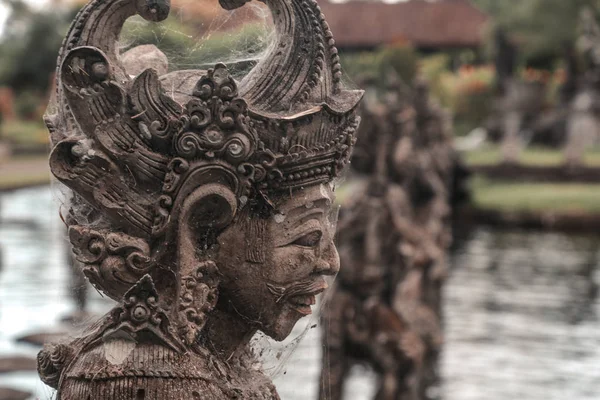 Old weathered religious statue at Bali