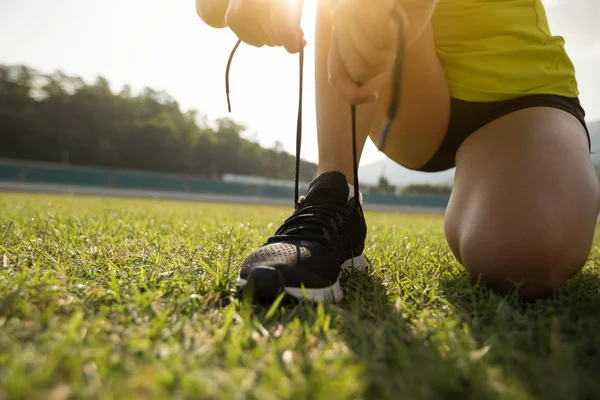 Young Fitness Woman Runner Tying Shoelace Stadium Tracks — Stock Photo, Image