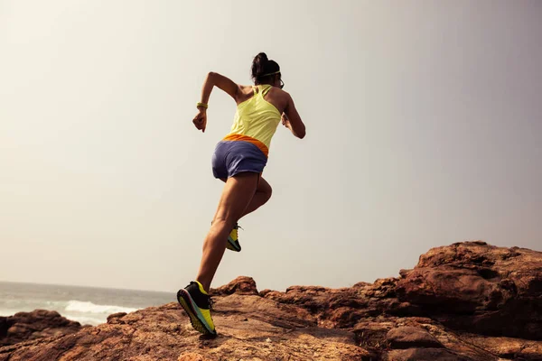 Young Fitness Woman Trail Runner Running Rocky Mountain Top Seaside — Stock Photo, Image