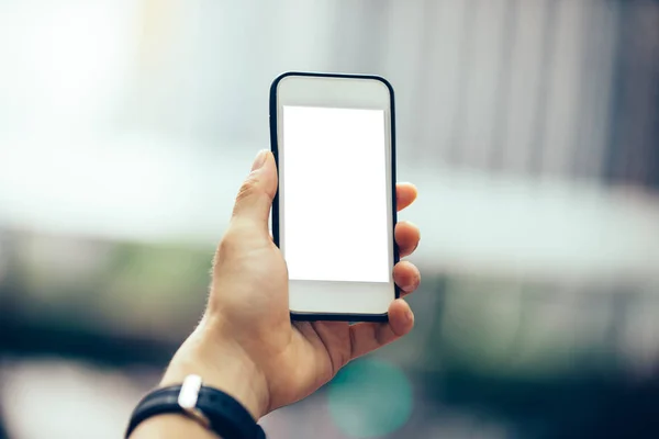 Hand Met Smartphone Met Blank Moderne Stad — Stockfoto