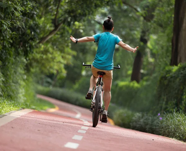 Woman Riding Bike Sunny Park Trail Hands — Stock Photo, Image