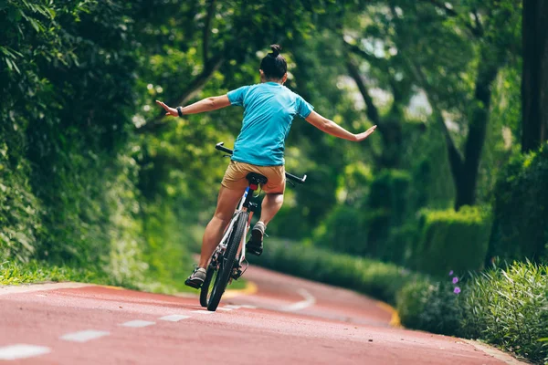 Woman Riding Bike Sunny Park Trail Hands — Stock Photo, Image