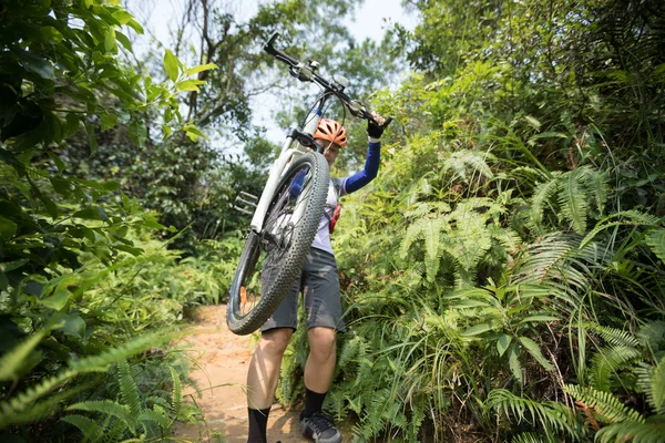 Cross Country Biking Woman Cyclist Carrying Mountain Bike Walking Tropical — Stock Photo, Image