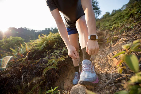 Female Trail Runner Tying Shoelaces Forest Trail — Stock Photo, Image