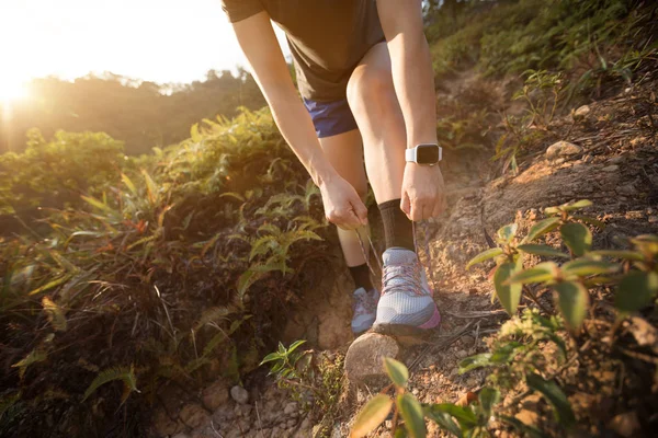 Female Trail Runner Tying Shoelaces Forest Trail — Stock Photo, Image