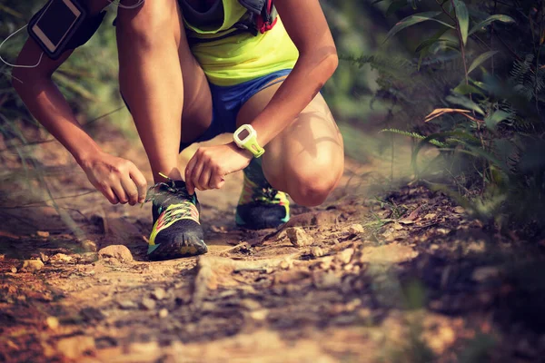 Young Woman Ultra Marathon Runner Tying Shoelace Forest Trail — Stock Photo, Image