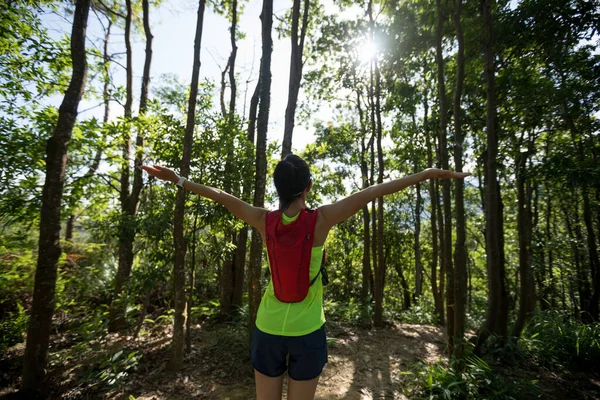 Cheering Ftness Woman Trail Runner Outstretched Arms Sunshine Running Tropical — Stock Photo, Image