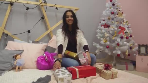 Girl Looks Gifts Rejoices Birthday New Year Christmas Holiday — Stock Video