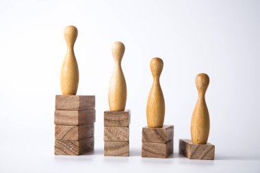 İş liderlik kavramı. Ahşap figürler bloklar