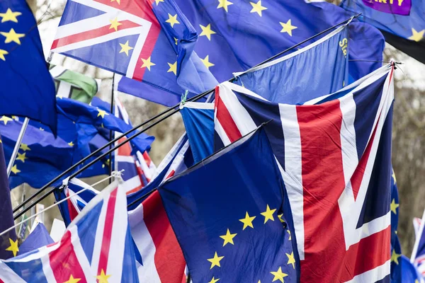 European Union and British Union Jack flag flying together. A symbol of the Brexit EU referendum